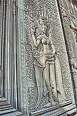 Angkor Wat temple, the fourth enclosure, the bas reliefs of the west gopura, superbly preserved devatas, either individually or in groups of two or three, amongst the finest in the monument. 